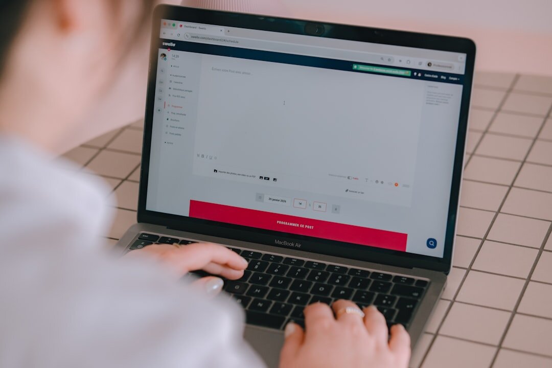 japanese student coding on laptop