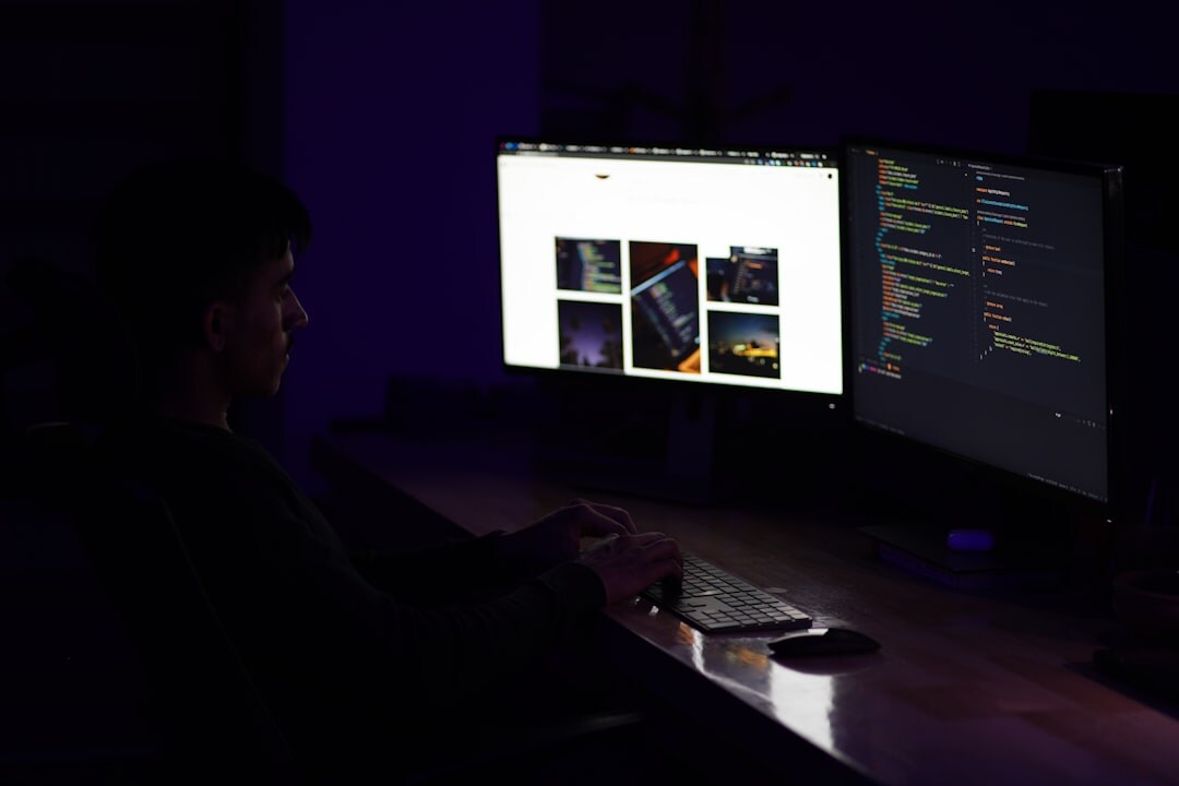 japanese programmer at desk