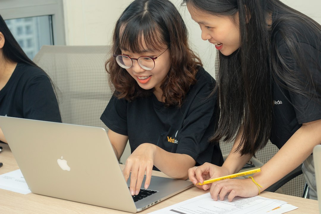 group of students coding together