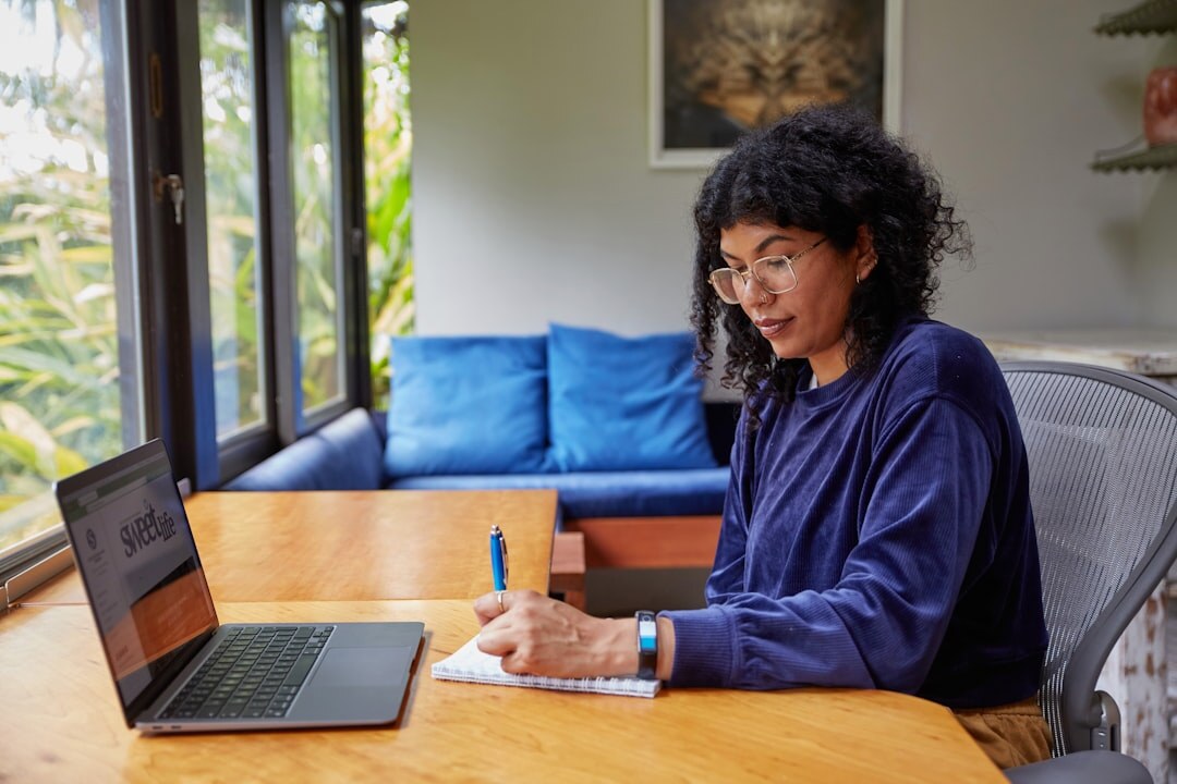 person studying at home desk