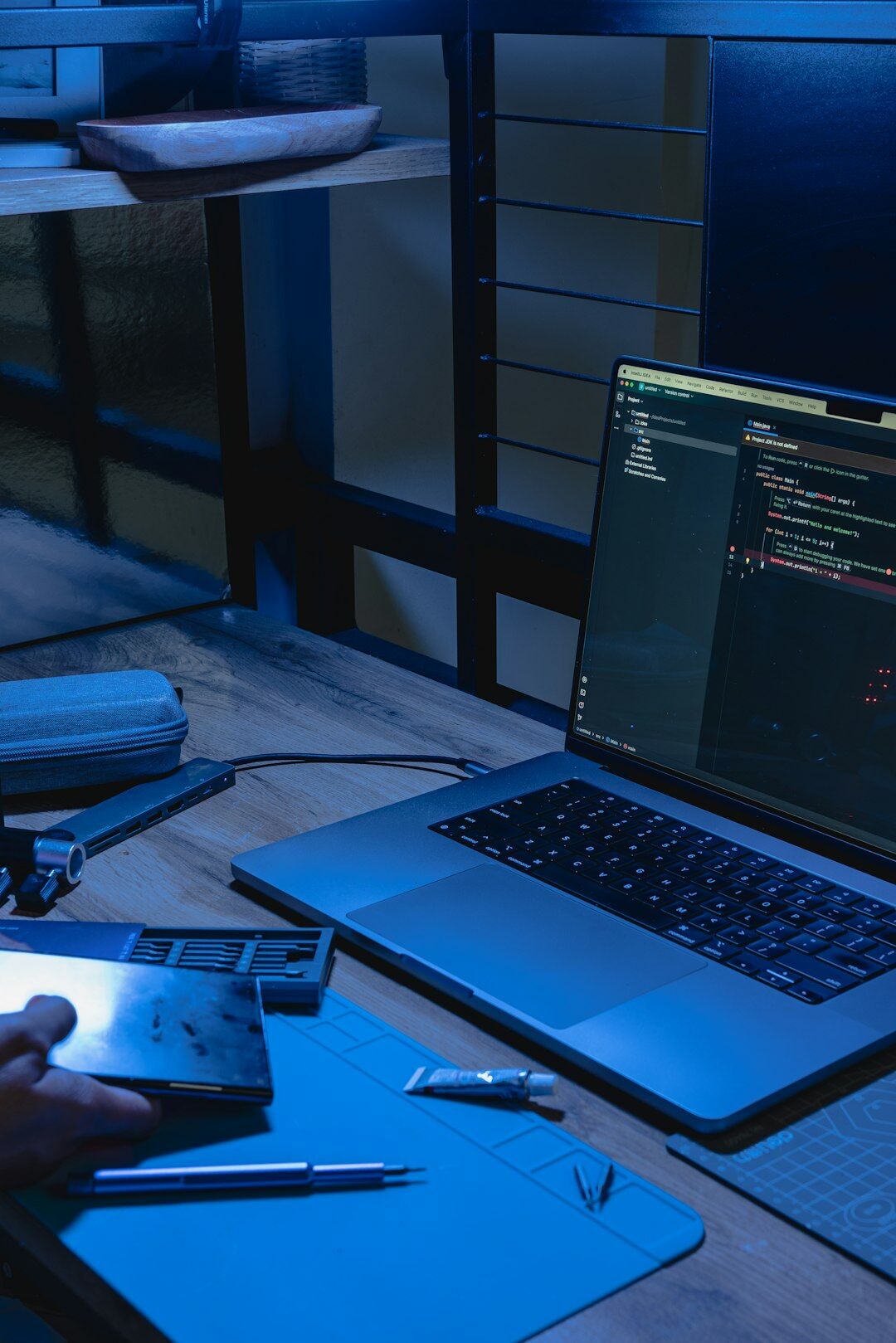japanese programmer at desk