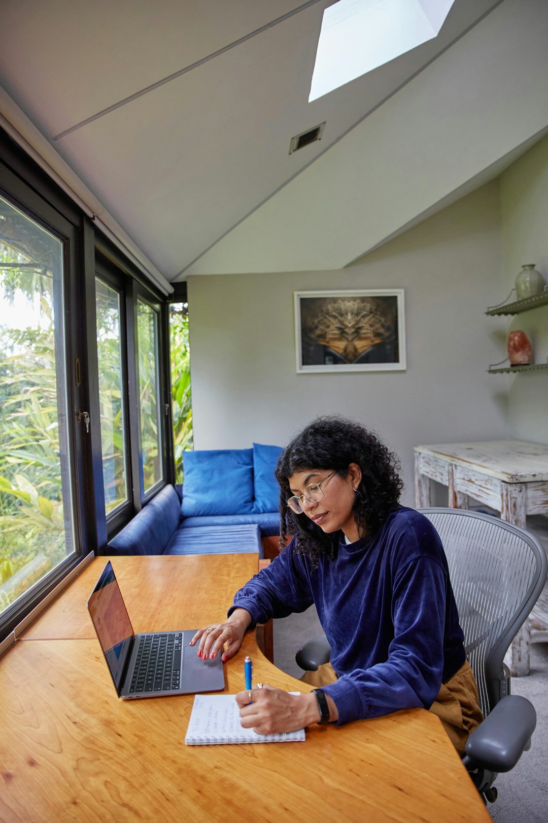 person studying at home desk